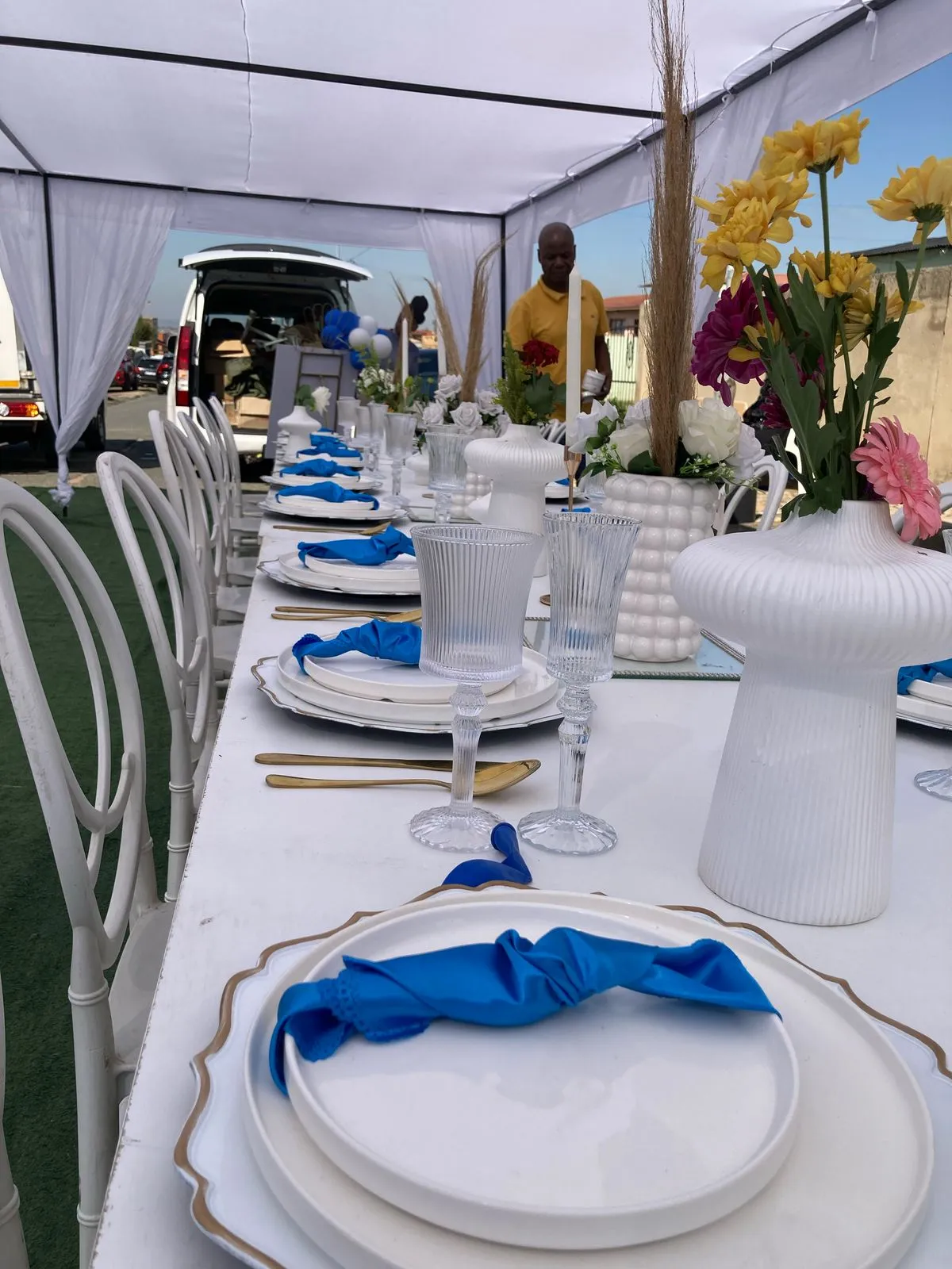 Premium event setup with sophisticated balloon decor and elegant furniture